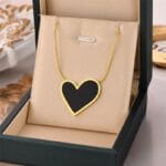 Elegant Gold Tone Heart Necklace with Black Inlay Pendant