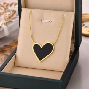 Elegant Gold Tone Heart Necklace with Black Inlay Pendant