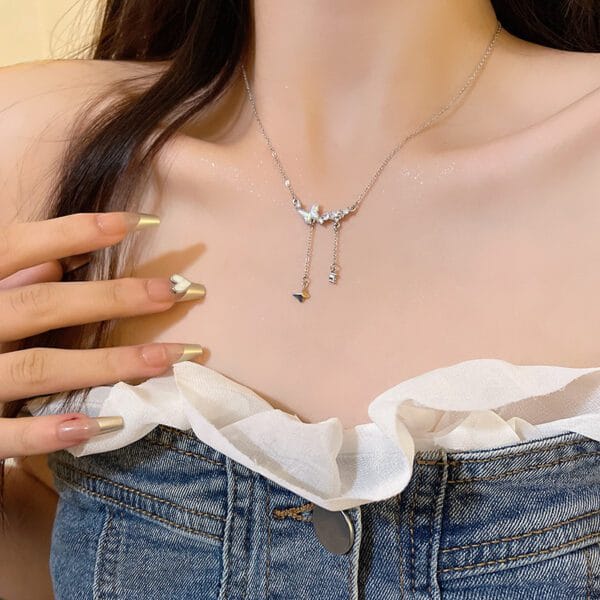 Elegant Gold and Black Heart Necklace with Polished Pendant