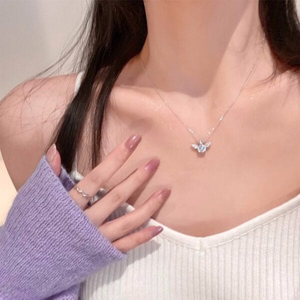 1772248838665539584 Silver Blue Butterfly Pendant Necklace | Dainty Crystal Wing Chain