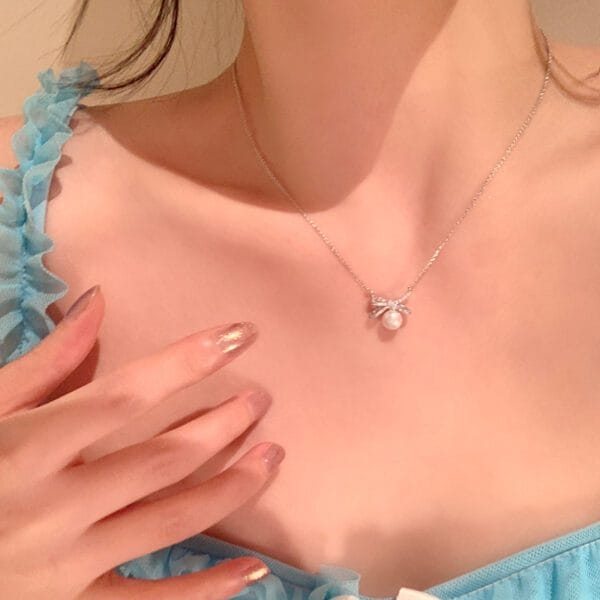 Silver Pearl Bow Pendant Necklace | White Crystal Charm Chain