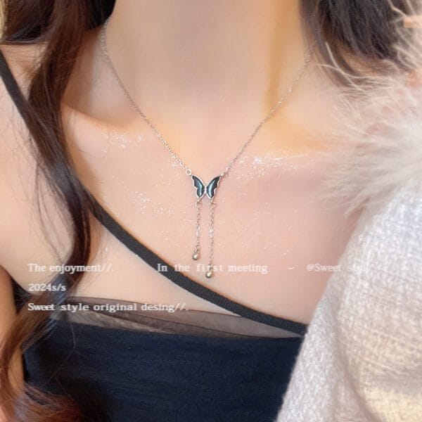 1845085191006195712 Silver Black Teal Butterfly Tassel Necklace | Lariat Drop Chain
