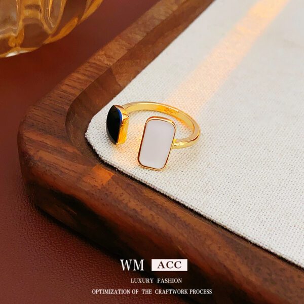 1825398157127847936 Stylish Gold Plated Stainless Steel Open Ring - Black & White Inlay