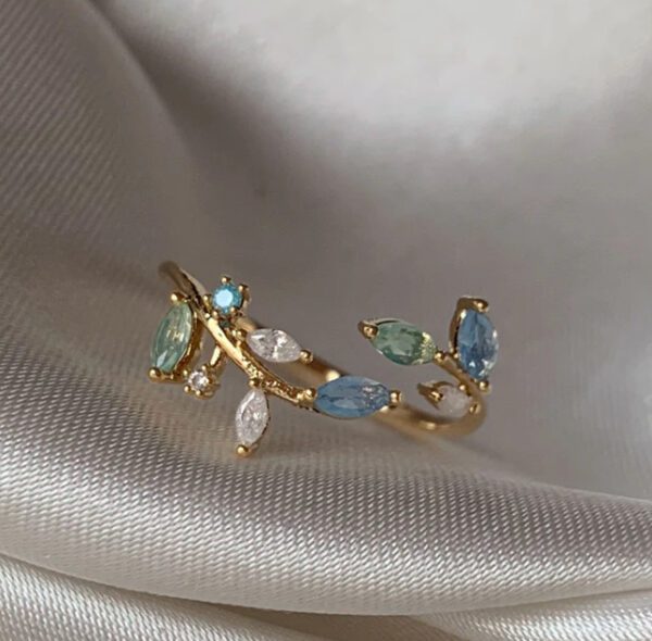 1846198570697494528 Dainty Gold Leaf Ring with Blue & Green Multicolor Gemstones