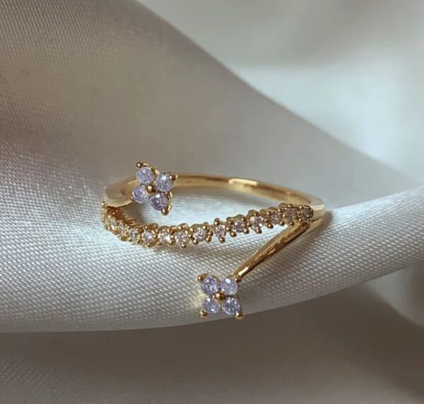 1846198634962620416 Dainty Gold Adjustable Flower Ring - Stainless Steel Lilac CZ
