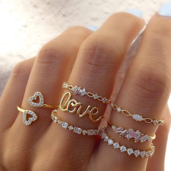 1927313055516069888 Dainty Gold Stacked Rings Set - Love, Heart & CZ Fashion Bands