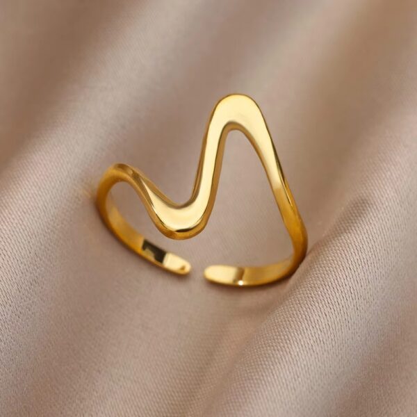 1938784686532857856 Gold Wave Ring | Sculptural Open Band Flowing Crest Statement Ring