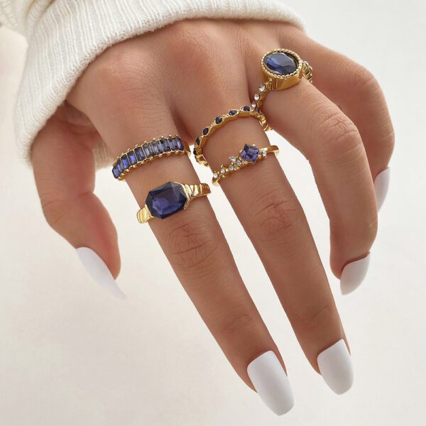 1939981310391095296 5-Piece Gold Plated Deep Blue Gemstone Stackable Ring Set