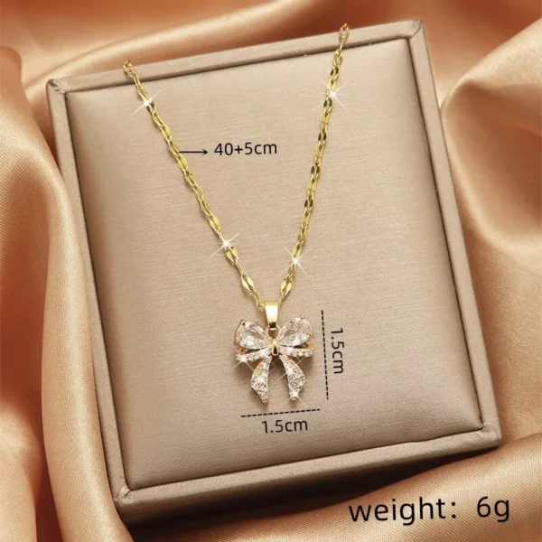 1960157569163071488 Sparkling Gold Bow Necklace with CZ Stones - Stainless Steel