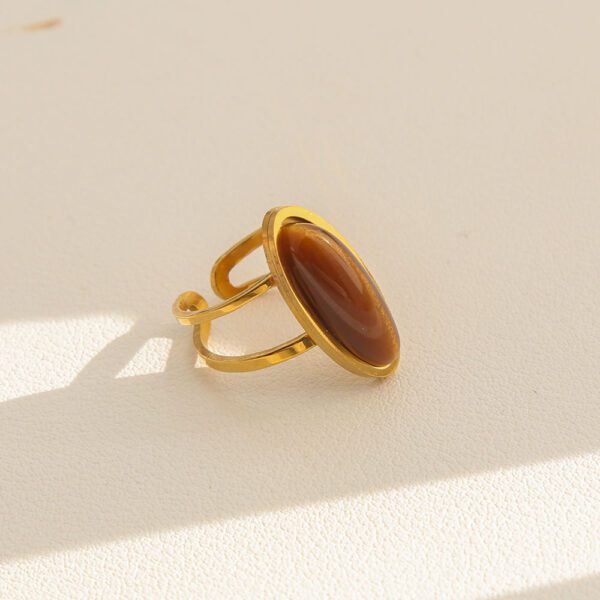 1985991974708187136 Elegant Gold Stainless Steel Adjustable Ring with Brown Cat's Eye Stone